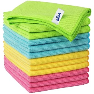 Stack of colorful microfiber cleaning cloths in green, blue, yellow, and pink.