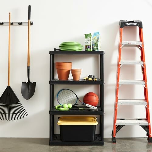 Organized garage with shelf, tools, and ladder.