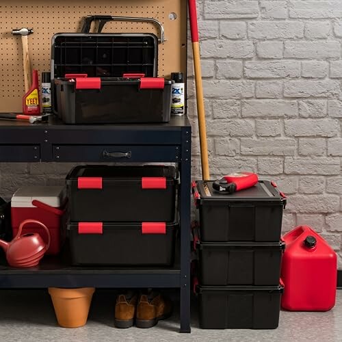 Organized garage with toolboxes, gas can, and gardening tools