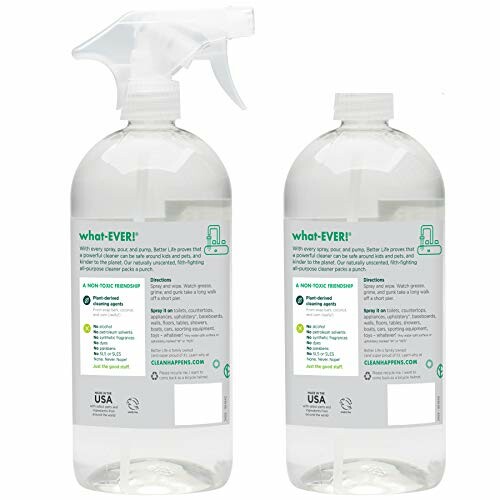 Two bottles of non-toxic cleaning spray with white labels and green text.