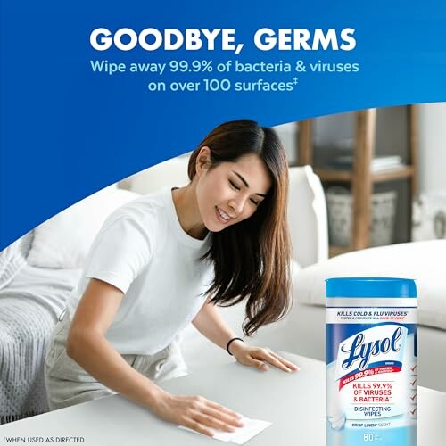 Woman using Lysol wipes to clean a surface, promoting germ removal.